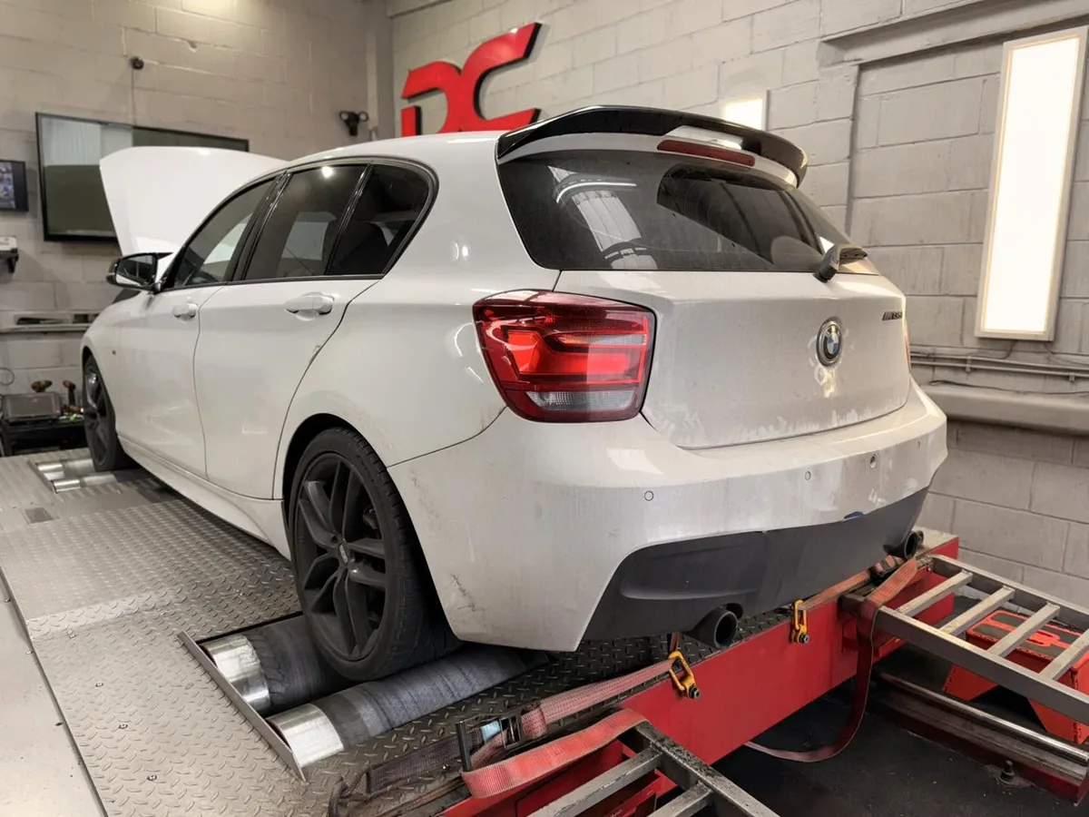 BMW M135i F20 rear view strapped to the dyno at DC Remapping UK